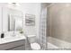 Well-lit bathroom with a tub-shower combination and modern fixtures at 24558 Blue Heron Cir # 402, Lancaster, SC 29720