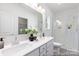 Stylish bathroom with double vanity, and glass-enclosed shower at 24558 Blue Heron Cir # 402, Lancaster, SC 29720