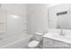 Bright bathroom featuring a shower-tub combo, vanity, and modern fixtures at 24558 Blue Heron Cir # 402, Lancaster, SC 29720