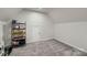 A spacious room with unique angles, carpeted floors, and ample potential for customization at 308 Valhalla Dr, Harrisburg, NC 28075
