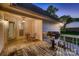 A cozy deck with a built-in grill, outdoor seating, and inviting ambiance at 308 Valhalla Dr, Harrisburg, NC 28075