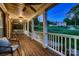Cozy covered front porch with wooden floors and inviting outdoor seating at 308 Valhalla Dr, Harrisburg, NC 28075