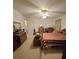 A bedroom with striped bedding and a ceiling fan at 317 Robert Keever Rd, Stanley, NC 28164