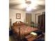Bedroom with a large bed, wooden furniture, and a ceiling fan at 317 Robert Keever Rd, Stanley, NC 28164