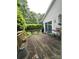 Outdoor deck space featuring wood decking, perfect for relaxing and enjoying the backyard view at 317 Robert Keever Rd, Stanley, NC 28164