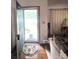 Welcoming entryway with hardwood floors, a view into the living space, and ample natural light at 317 Robert Keever Rd, Stanley, NC 28164