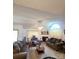 A living room with two sofas, an armchair, a ceiling fan, and a fireplace at 317 Robert Keever Rd, Stanley, NC 28164