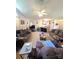 An open concept living room with view to the kitchen, plus comfortable couches at 317 Robert Keever Rd, Stanley, NC 28164