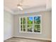 Primary bedroom features large window, natural light, fan and tray ceiling at 3308 Watkins Rd, Monroe, NC 28110