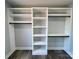 Walk-in closet with custom shelving, drawers and hanging space at 3308 Watkins Rd, Monroe, NC 28110