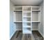 Walk-in closet with custom shelving, drawers and hanging space at 3308 Watkins Rd, Monroe, NC 28110