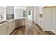 Well-equipped kitchen features stainless steel appliances, quartz countertop, and modern cabinets at 3308 Watkins Rd, Monroe, NC 28110