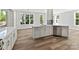 Bright, open kitchen with a kitchen island, stainless steel dishwasher and natural light at 3308 Watkins Rd, Monroe, NC 28110