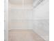 Walk-in closet with ample shelving for storage and organization at 43014 Mimosa Ct, Indian Land, SC 29707