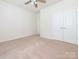 Neutral bedroom with a ceiling fan and ample closet space; perfect for relaxation at 43014 Mimosa Ct, Indian Land, SC 29707