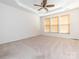 This bedroom has a ceiling fan and windows to provide plenty of light at 43014 Mimosa Ct, Indian Land, SC 29707