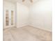 This bedroom has a ceiling fan and french doors to provide plenty of light at 43014 Mimosa Ct, Indian Land, SC 29707