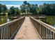 The community dock has seating to enjoy the lake view at 43014 Mimosa Ct, Indian Land, SC 29707