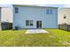 Large backyard with patio and light blue siding at 4437 Devonhill Ln, Charlotte, NC 28269