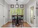 Bright breakfast nook with natural light, a round table, and comfortable seating at 4516 Stryker Dr, Matthews, NC 28104