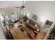 Spacious living room with high ceilings, hardwood floors, and large windows offering natural light at 4516 Stryker Dr, Matthews, NC 28104