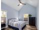 Vaulted ceiling bedroom filled with natural light with a comfortable looking bed and neutral decor at 4594 N Wynswept Dr, Maiden, NC 28650