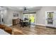 Cozy dining area features table and chairs, as well as sliding doors to the backyard at 4594 N Wynswept Dr, Maiden, NC 28650
