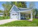 View of the detached garage and carport of this stunning property at 4594 N Wynswept Dr, Maiden, NC 28650