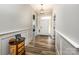 Inviting entry hallway with hardwood flooring, fresh paint, and detailed trim work at 4594 N Wynswept Dr, Maiden, NC 28650