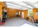 Spacious garage with sealed concrete floors and wood panel walls at 4594 N Wynswept Dr, Maiden, NC 28650