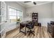 Home office features a desk, bookshelves, wainscotting, and lots of natural light at 4594 N Wynswept Dr, Maiden, NC 28650