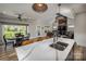 Stylish kitchen with granite countertops, stainless steel appliances, and ample cabinet space at 4594 N Wynswept Dr, Maiden, NC 28650