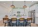 Beautiful white kitchen with granite countertops and island with barstool seating at 4594 N Wynswept Dr, Maiden, NC 28650
