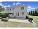 Spacious backyard featuring a patio with outdoor dining and grilling areas for entertaining at 5025 Willing Ct, Fort Mill, SC 29707