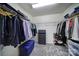 Walk-in closet features ample hanging space, built-in drawers, and convenient shelving at 5025 Willing Ct, Fort Mill, SC 29707