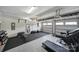 Spacious garage transformed into a functional home gym with a variety of workout equipment at 5025 Willing Ct, Fort Mill, SC 29707