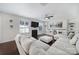 Spacious living room with a fireplace, built-in shelving, and a comfortable sectional sofa at 5025 Willing Ct, Fort Mill, SC 29707