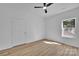 Simple bedroom with natural light, ceiling fan, and minimalist design at 504 Christopher Ln, Chester, SC 29706
