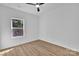 Bright bedroom with natural light, ceiling fan, and modern flooring at 504 Christopher Ln, Chester, SC 29706