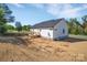 New construction home showcasing rear exterior with wooden deck and classic siding at 504 Christopher Ln, Chester, SC 29706
