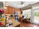 Bright kitchen featuring wood cabinets, granite countertops, stainless appliances, and eat-in breakfast nook at 512 Park View Dr, Belmont, NC 28012