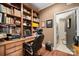 Inviting office with a built-in bookcase and a view of the laundry area, maximizing space and efficiency at 512 Park View Dr, Belmont, NC 28012