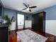 Well-lit bedroom with hardwood floors and window at 5621 Landale Ct, Concord, NC 28027