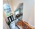 Grand foyer featuring a soaring ceiling, decorative chandelier, and elegant staircase with wood and iron accents at 5621 Landale Ct, Concord, NC 28027