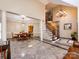 Spacious foyer featuring marble flooring and high ceilings with an elegant chandelier at 5621 Landale Ct, Concord, NC 28027