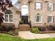 Elegant brick home featuring an attractive front door with decorative wrought iron at 5621 Landale Ct, Concord, NC 28027