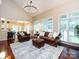 Open-concept living room with hardwood floors and lots of natural light at 5621 Landale Ct, Concord, NC 28027