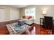 Bright living room with hardwood floors, natural light and a comfortable seating area at 5621 Landale Ct, Concord, NC 28027