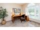 Cozy office space with bright window, tiled floors, and light wood desk at 5621 Landale Ct, Concord, NC 28027