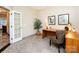 Office space with natural light, tiled floors, and light wood desk at 5621 Landale Ct, Concord, NC 28027